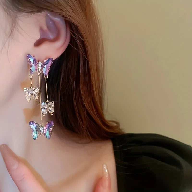 Silver needle electroplated alloy earrings with blue purple butterfly tassel and crystal flower details
