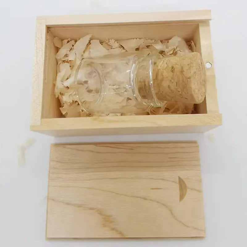 Transparent bottle-shaped USB flash drive with bamboo wood stopper showing drift bottle design
