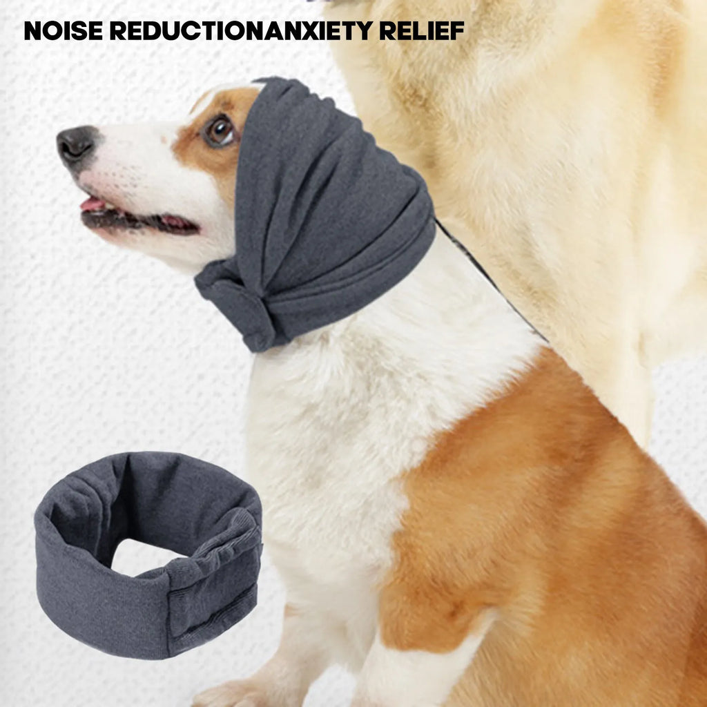 Dog wearing black calming hoodie head cover with ear wrap for noise reduction