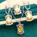 Olive and yellow anti-allergy alloy zircon jewellery set showing necklace, earrings, ring, and bracelet on a display.