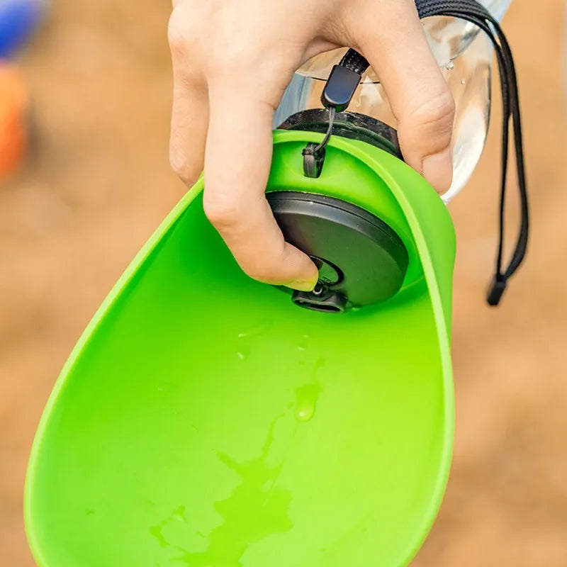 Sky blue portable pet water bottle with key lock showing 680ml capacity measurement
