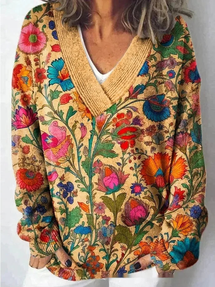 White women's V-neck long sleeve sweatshirt with a detailed 3D floral pattern print.