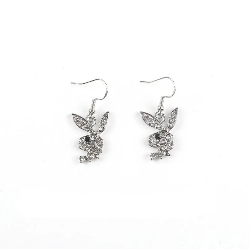 Cute rabbit-shaped stud earrings in silver, pink, or gold colour on a white background.