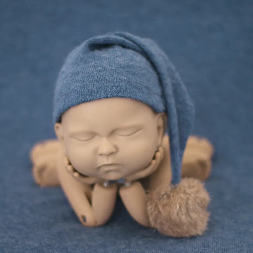 Hand-woven yarn baby photography hat in conical style, available in twelve colour options