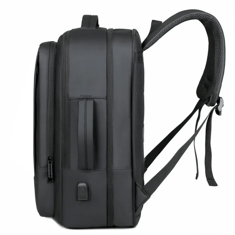 Black waterproof Oxford cloth business backpack with curved shoulder straps and laptop compartment