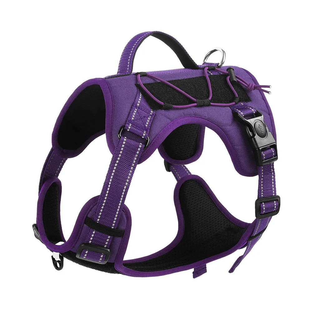 Orange reflective dog harness with black hand-holding rope shown on a dog.