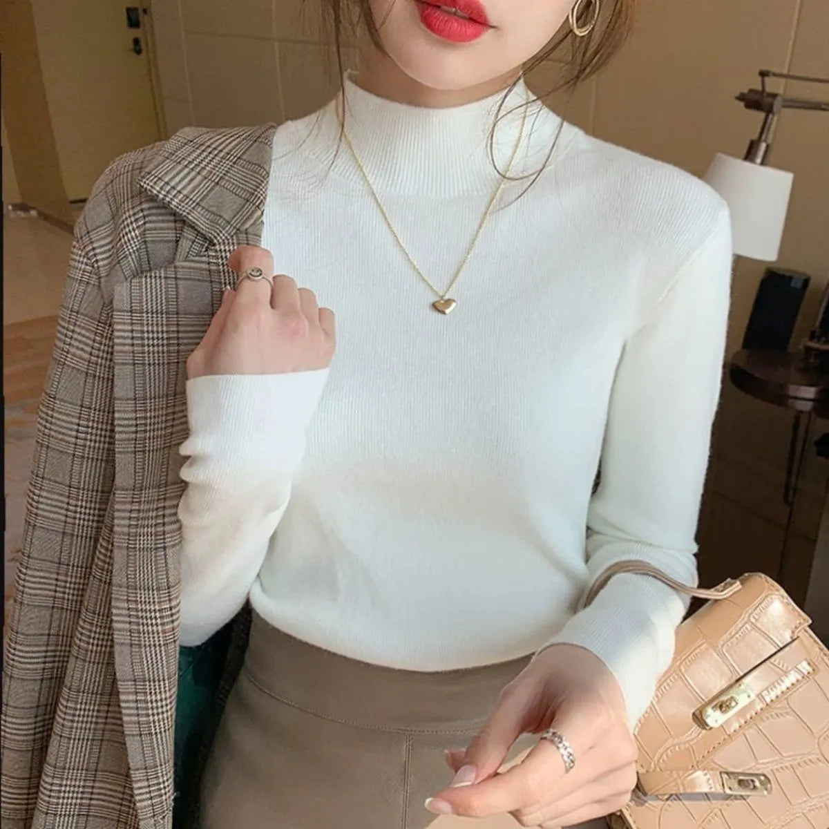 Slim fit long sleeve viscose bottoming shirt in apricot colour on a hanger