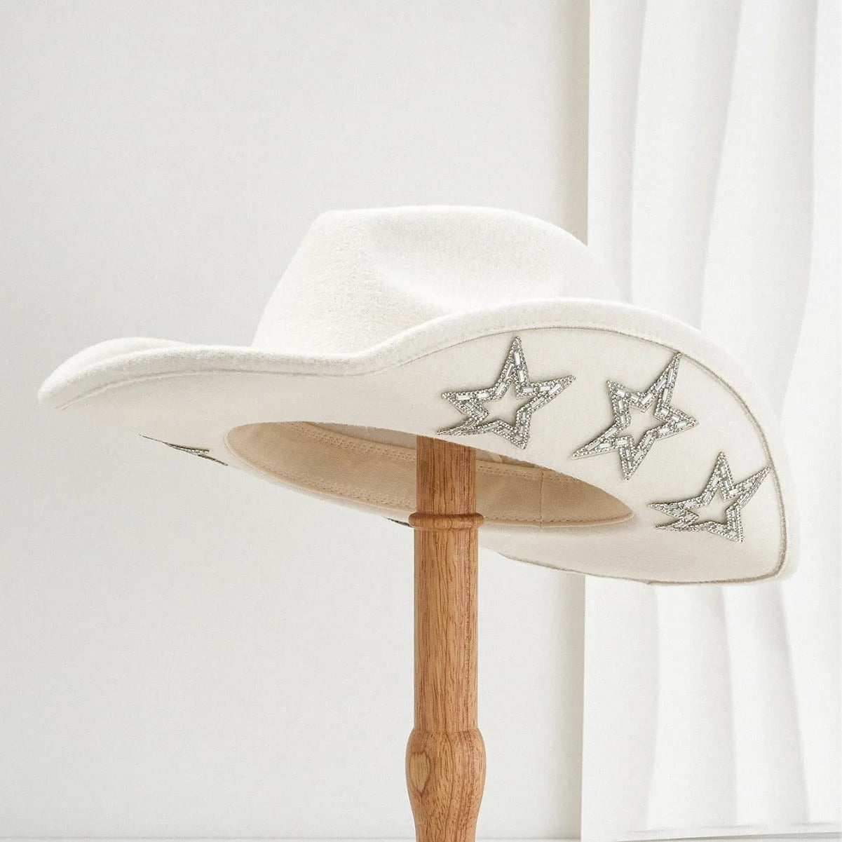 Polyester woven western cowboy hat with conical crown in beige colour with hexagonal star details