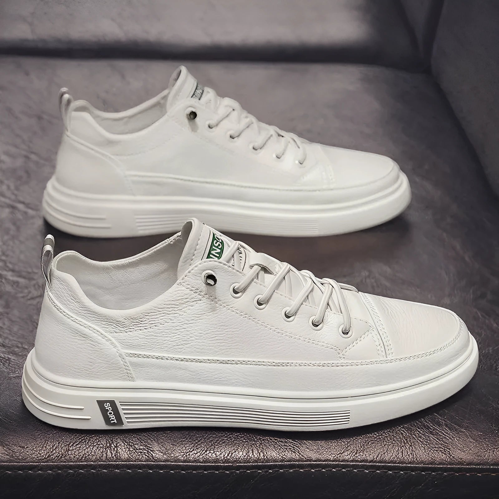 Men's white casual PU shoes with round toe, flat bottom, and low heel on a plain background.