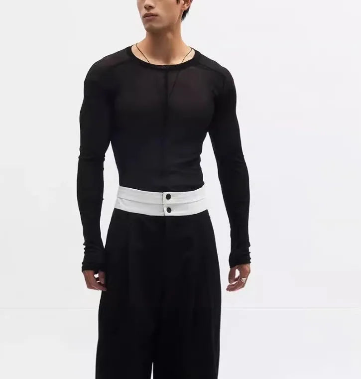 Black slim-fit women's pullover top with see-through mesh texture and long sleeves.