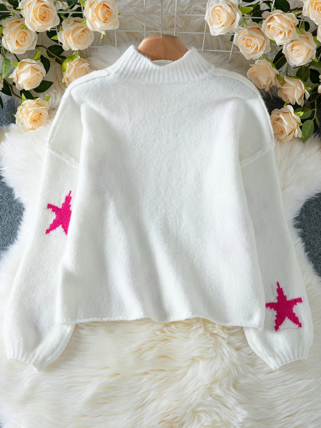 White women's loose turtleneck pullover sweater with five-pointed star pattern