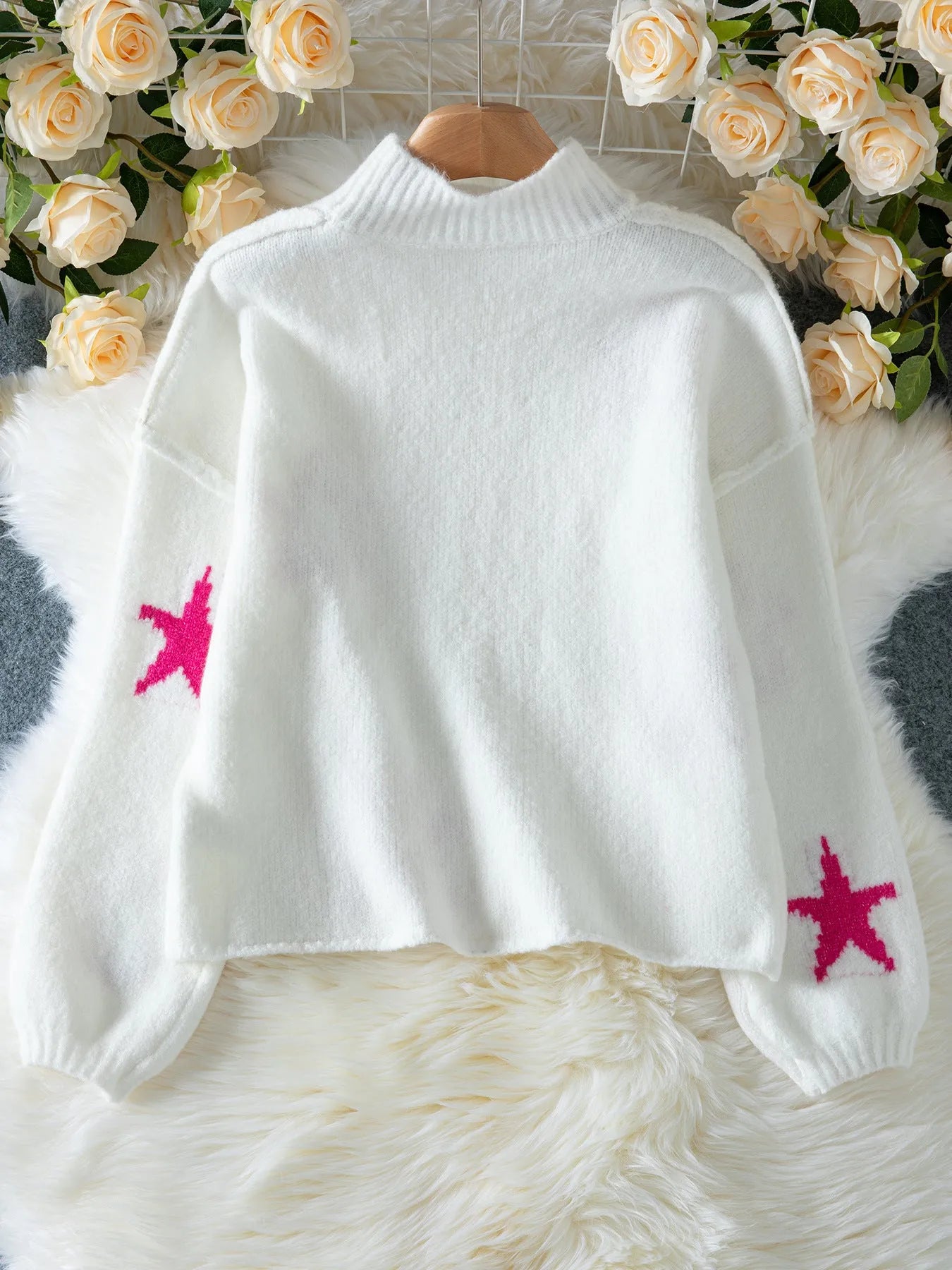 White women's loose turtleneck pullover sweater with five-pointed star pattern