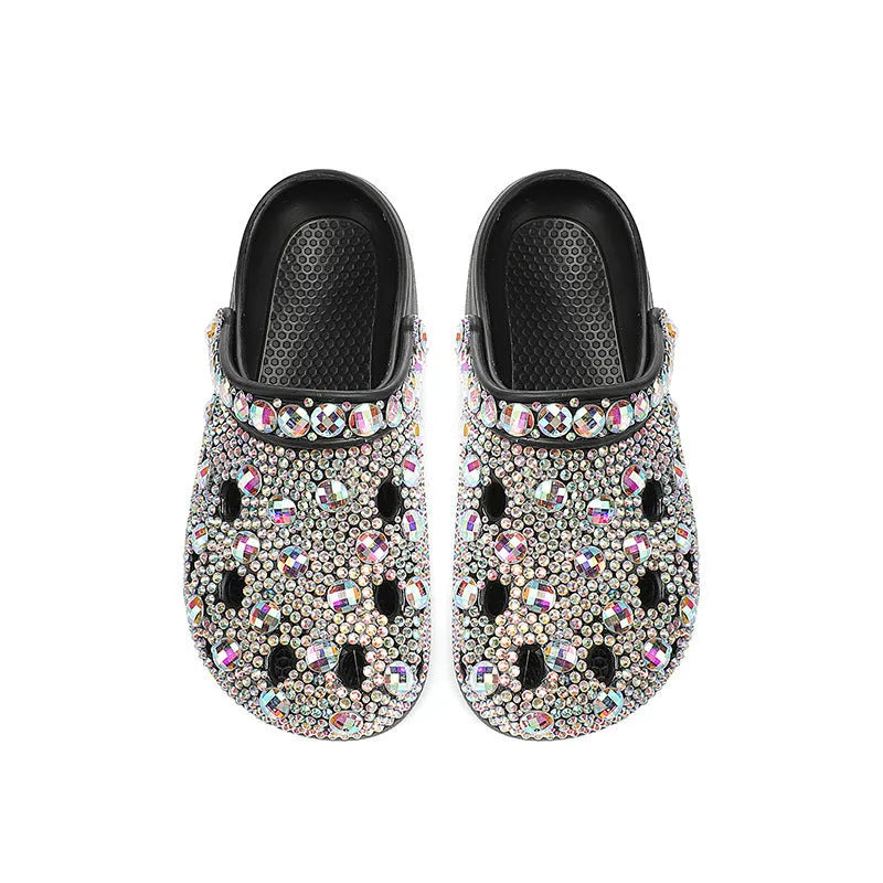 Black women's platform sandals with rhinestone details on an open hole design EVA upper.