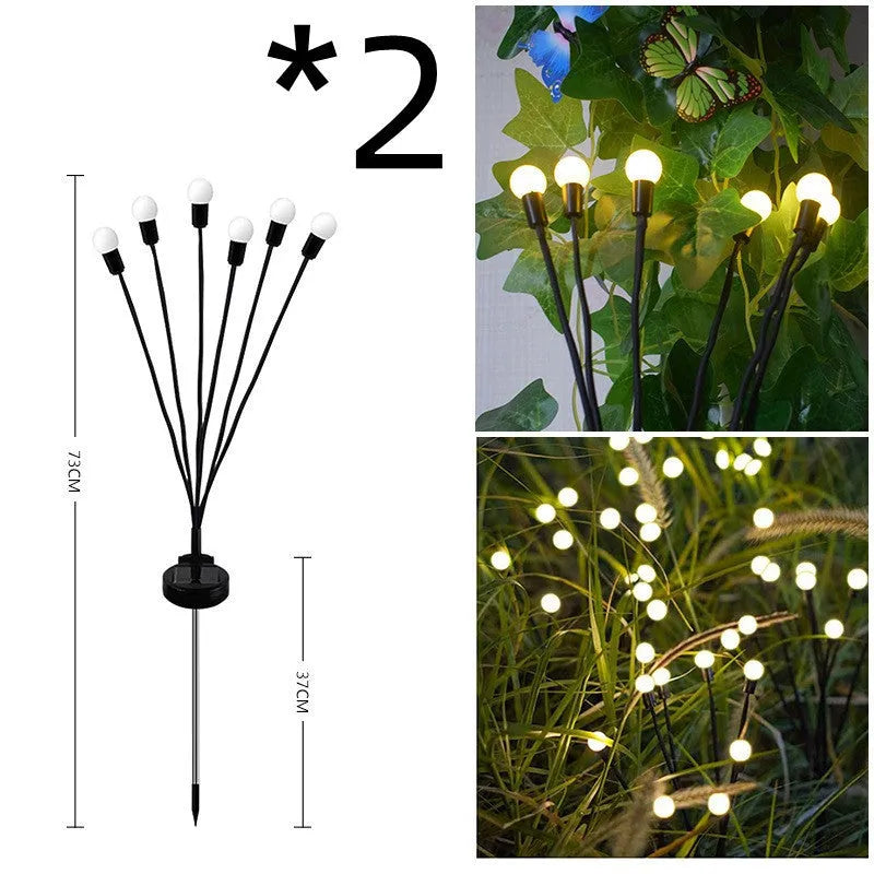 Solar-powered LED garden ground light with multiple light heads and a stainless steel spike for installation.