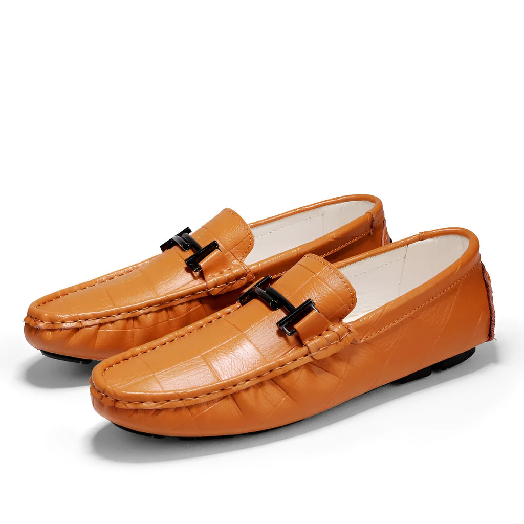 Men's black casual leather shoes with a silver belt buckle on the upper
