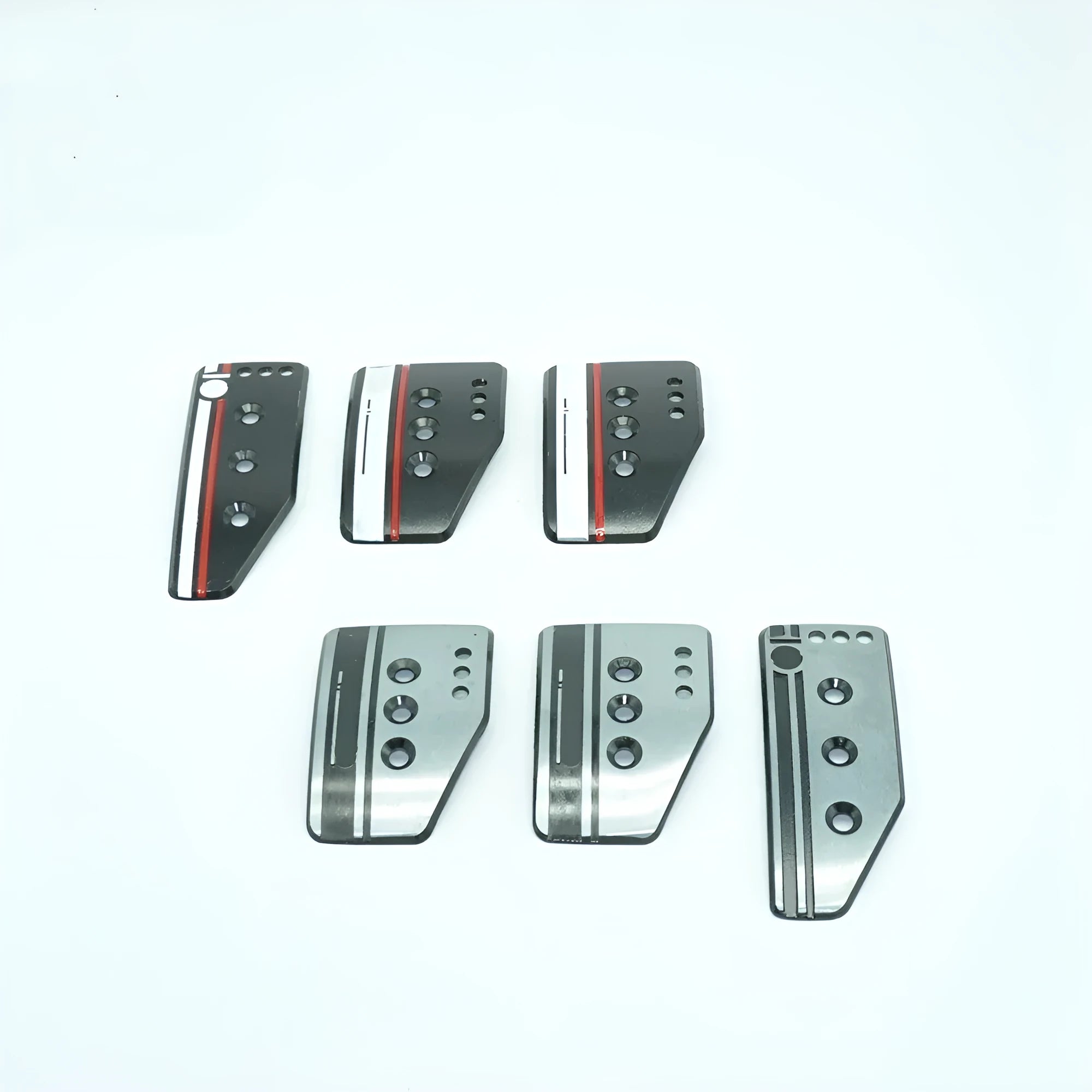 Aluminium manual transmission car pedal set showing brake, accelerator and clutch pedals