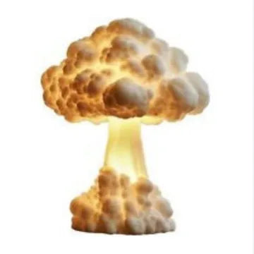 Mushroom cloud shaped atomic explosion table lamp with USB power cable on a desk.