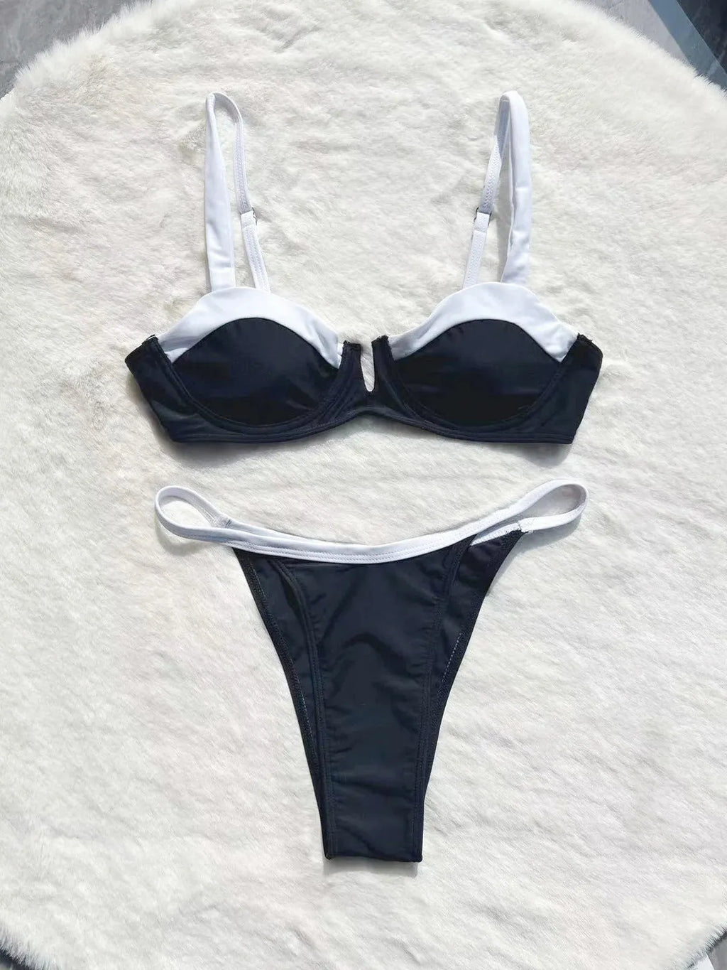 Black low waist bikini women's swimsuit with split stitching detail, brief style swimwear