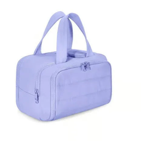 Large lightweight travel wash bag in beige colour with wide-opening design showing interior space