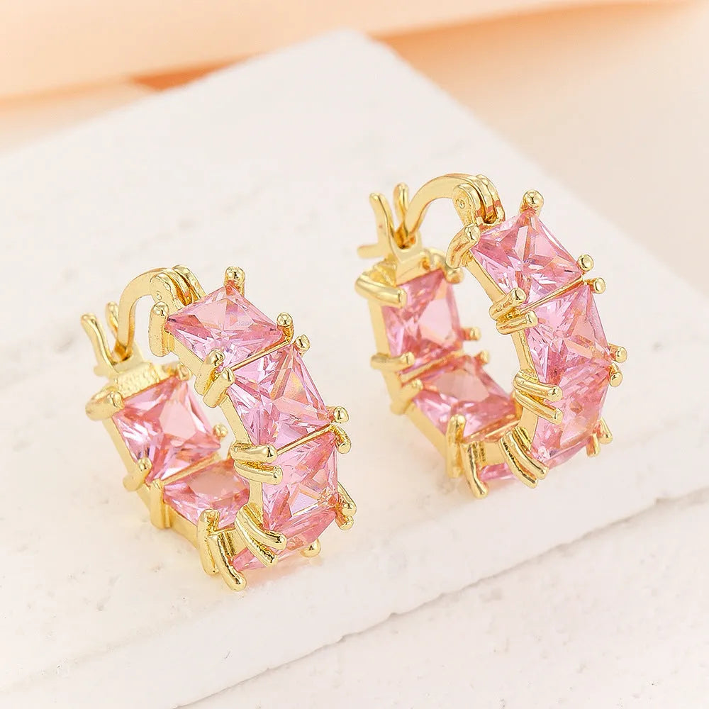 Geometric U-shaped zirconium earrings with round detailing in black, pink or white options