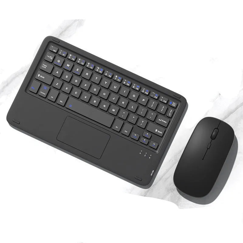 Pink wireless Bluetooth keyboard and matching dual-mode charging mouse on a desk