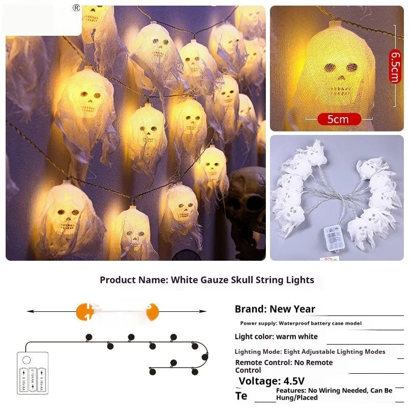 Halloween battery-powered coloured LED string lights on a plastic spool with battery box, options for 1.5m or 2.5m length.