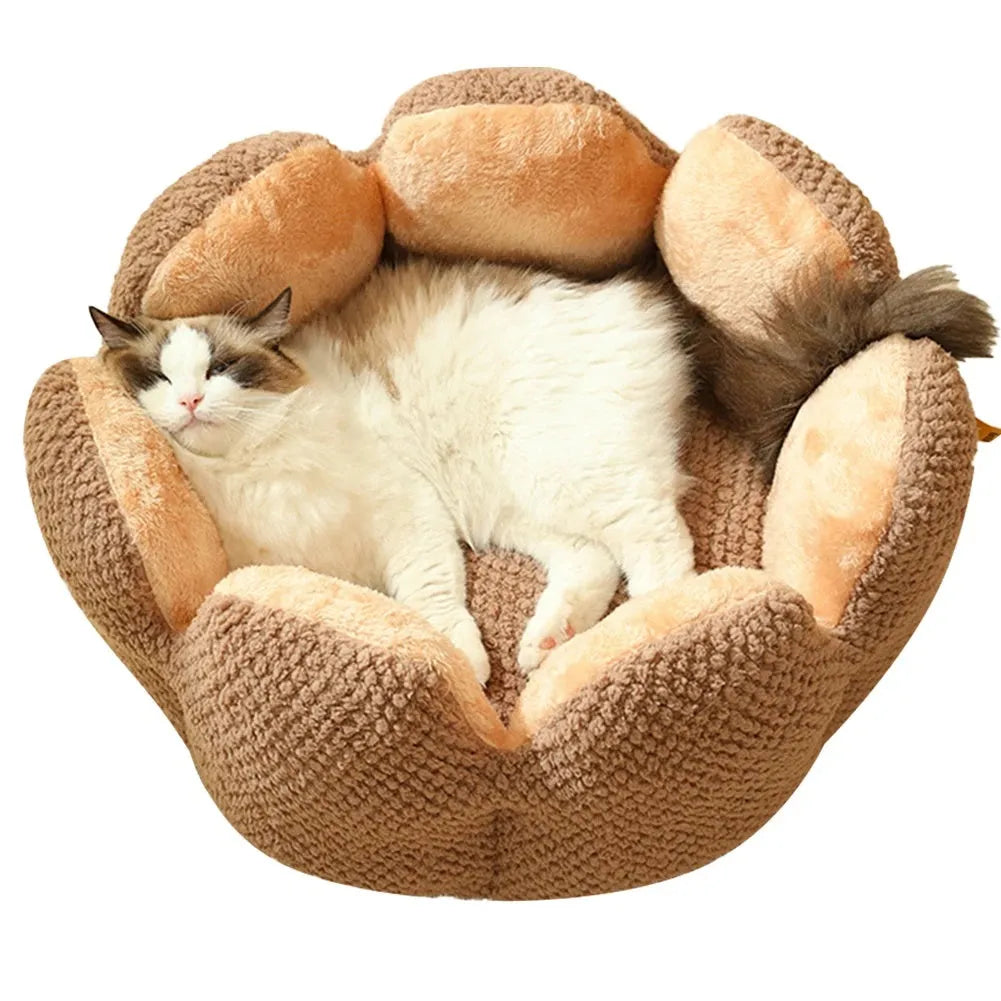 Green cactus petal shape plush kennel bed for cats and small dogs on a hardwood floor.