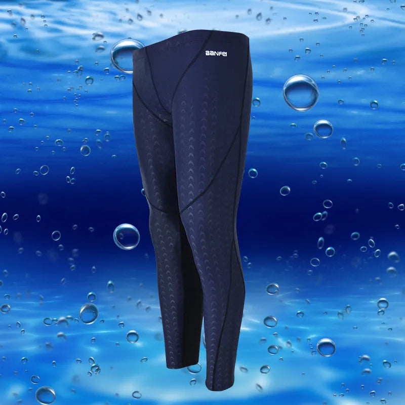 Men's black cropped nylon swimming trunks with mesh lining, shown on size chart