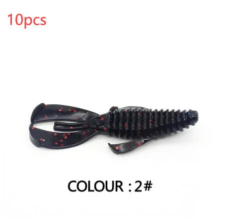8cm PVC fishing soft bait lure in multiple colour variations against fishing tackle background