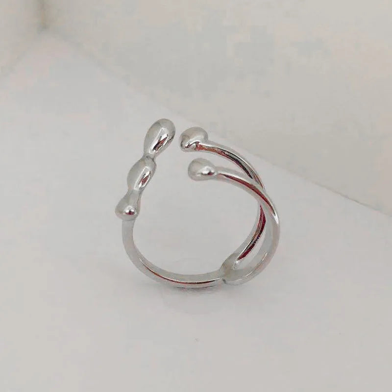 Gold or silver plated brass opening ring with circular sphere design for women