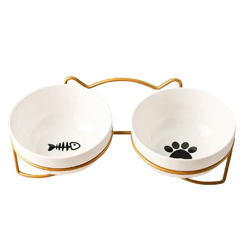 White ceramic cat bowl with decorative patterns on iron frame with cat ear details