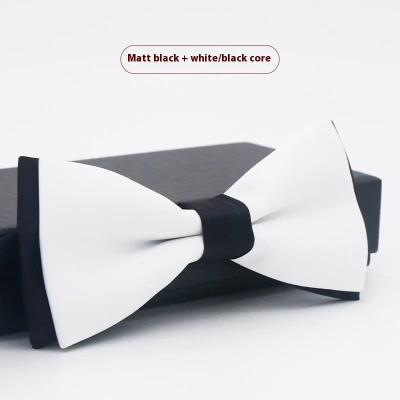 Men's flat head style polyester bow tie in a solid colour, shown with adjustable neck strap.