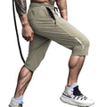 Men's grey ice silk cropped sports trousers with straight leg on a neutral background.