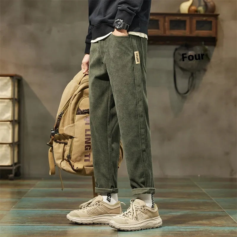Corduroy men's casual straight-leg trousers in solid colour with mid-waist rise and zipper fly