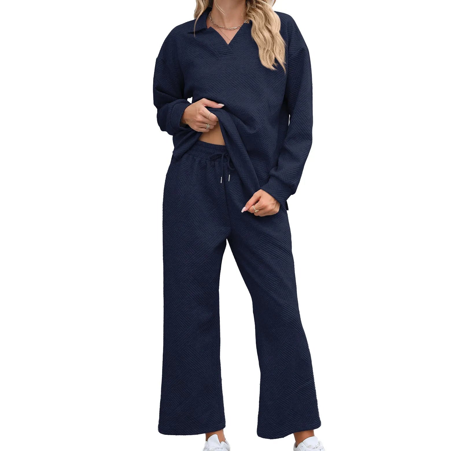 Women's black geometric pattern knitted jacquard long sleeve top and elastic waist cropped pants suit set.