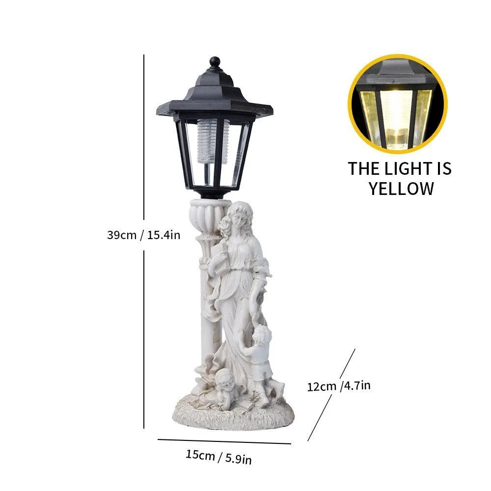 Solar hexagonal garden lamp with decorative resin figurine on plastic base for outdoor pathway lighting