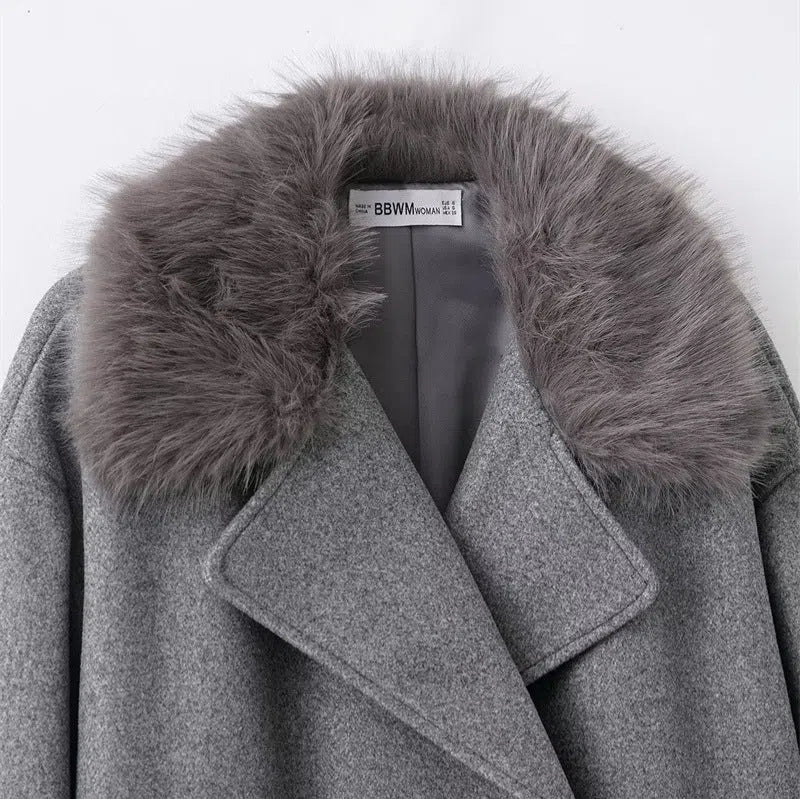Women's grey mid-length hooded belted wool cape coat with raccoon fur collar and pockets