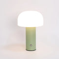 USB table lamp in black, green, orange, or white colours on a desk surface