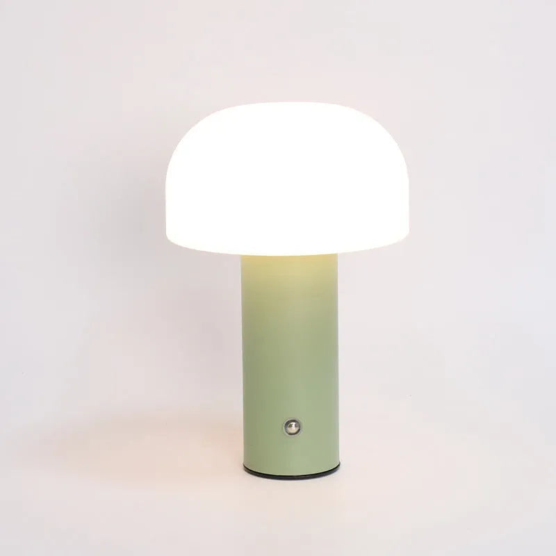 USB table lamp in black, green, orange, or white colours on a desk surface