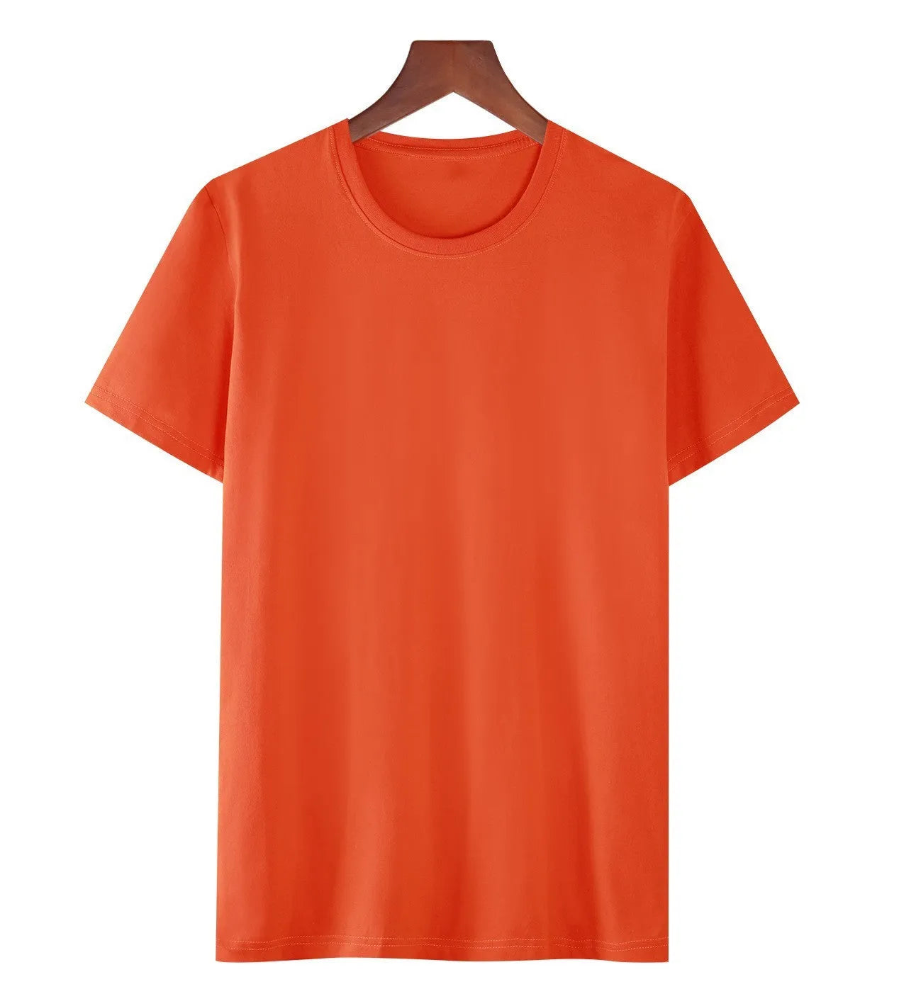Man wearing a black loose-fit cotton T-shirt with short sleeves, showcasing casual style.