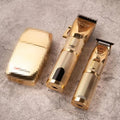 Gold-coloured cordless hair clipper with 25W power output for barbershop use