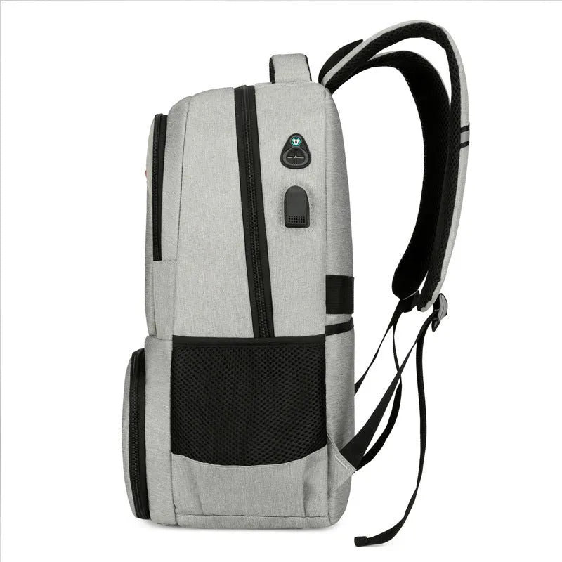 Light grey Oxford cloth insulated picnic backpack with curved shoulder straps and multiple compartments.