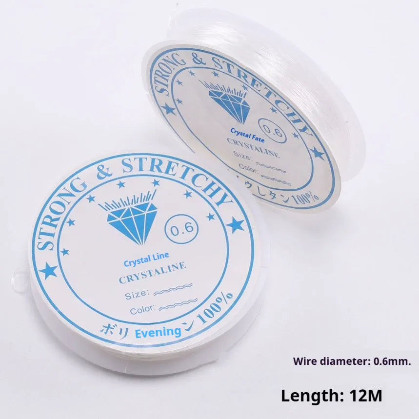 Clear white elastic fishing line on a reel for jewellery making and DIY crafts