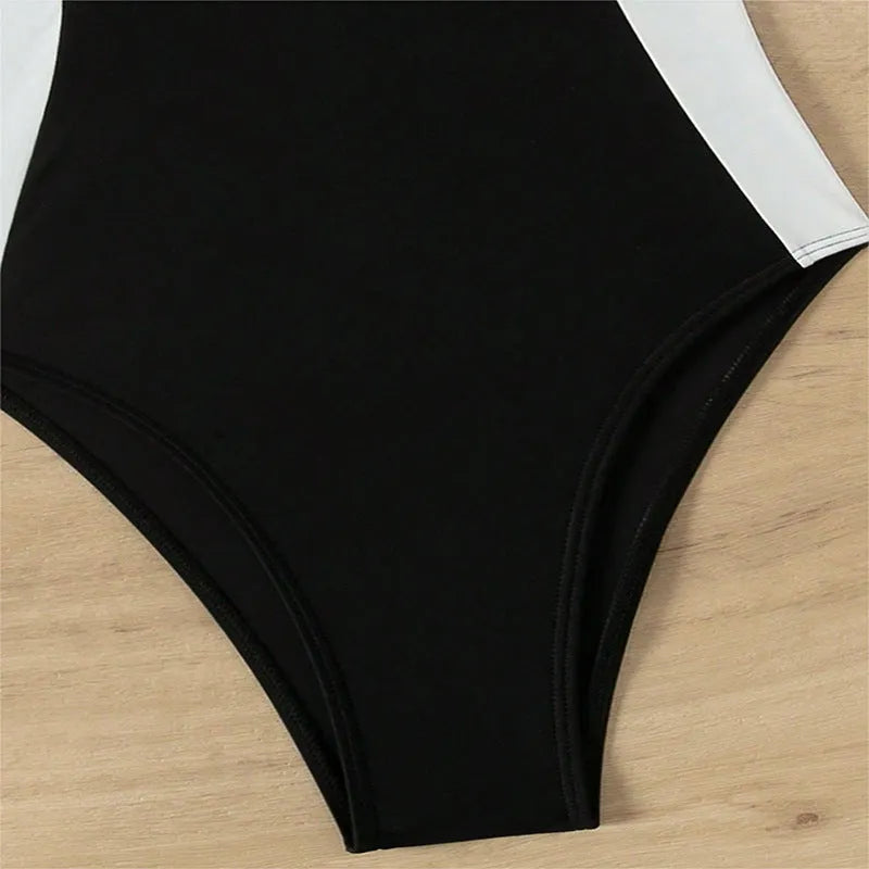 Women's black or white one-piece swimsuit with pearl spaghetti straps for swimming