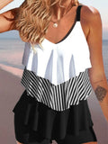Women's sleeveless backless spaghetti-strap bikini with ruffled split-side briefs in a floral print.