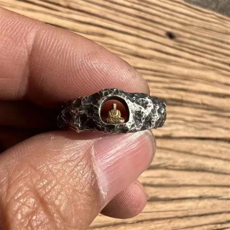 Hand-forged copper Buddha ring with grotto rock texture, shown in size 8.