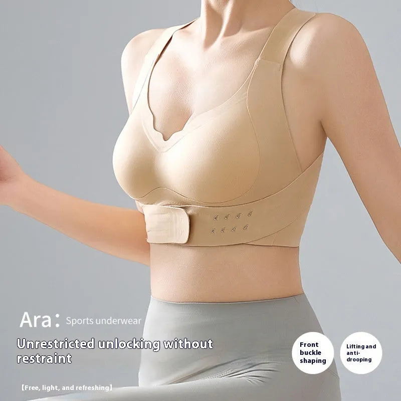 Women's front buckle yoga bra in black, showing back shaping design and adjustable straps.