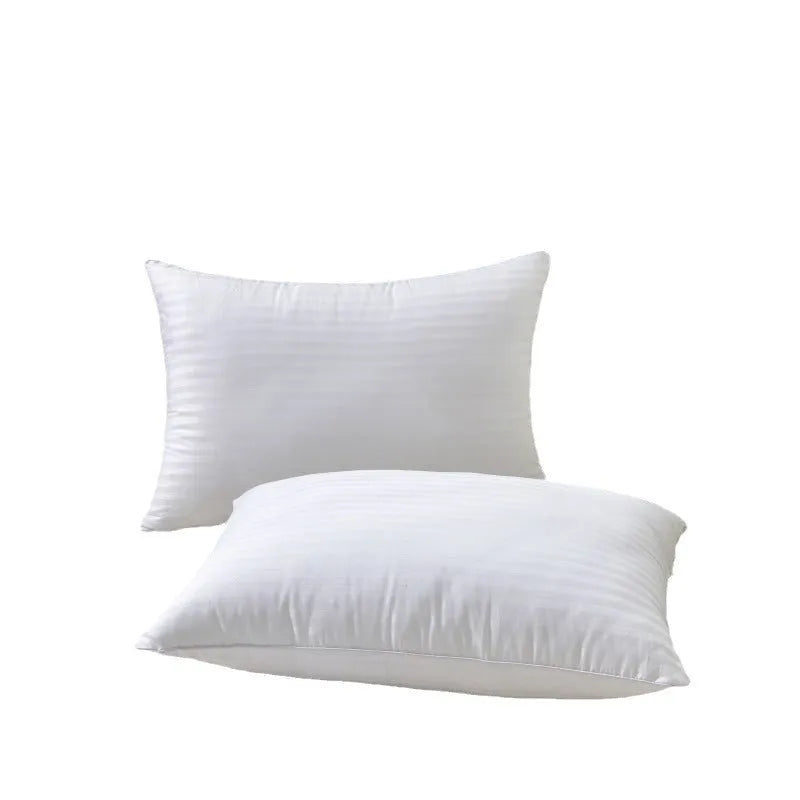 White cotton feather pillow with satin stripe detail, shown in low, medium, and high loft options.