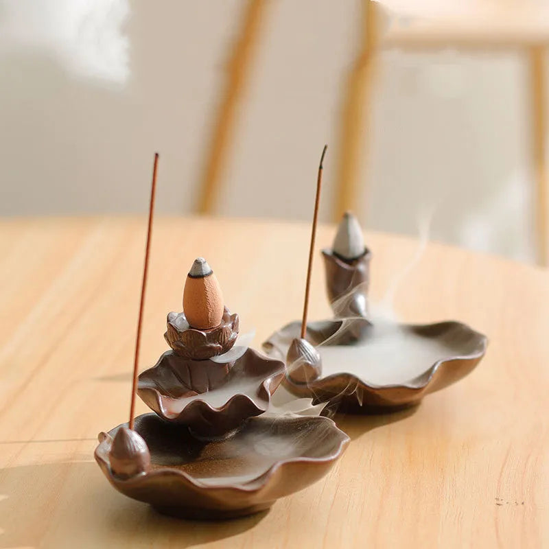 Square ceramic reverse flow incense burner with lotus and plum blossom decorative motifs