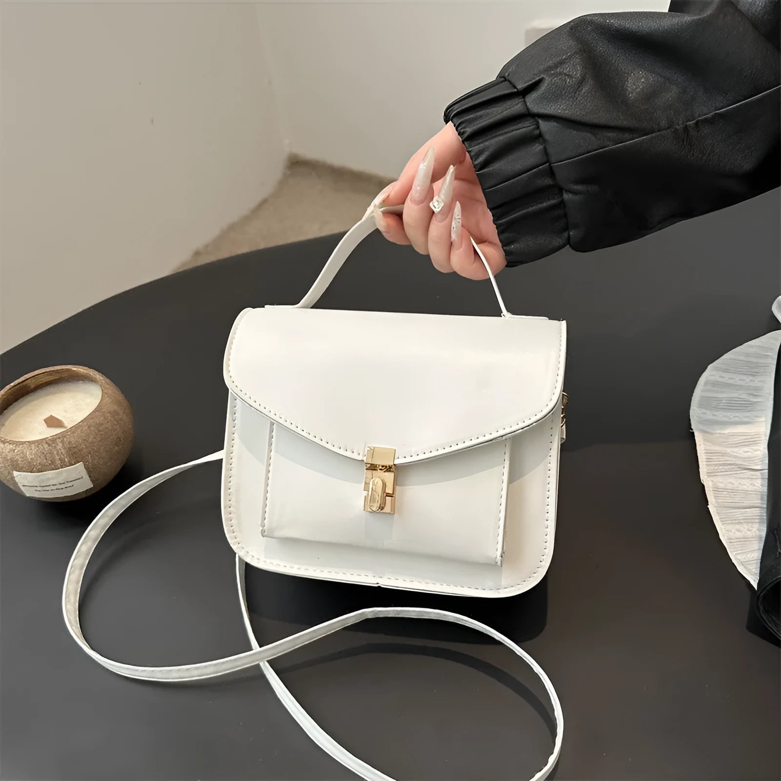 Retro style PU messenger bag in horizontal square format with sandwich pocket and crossbody strap